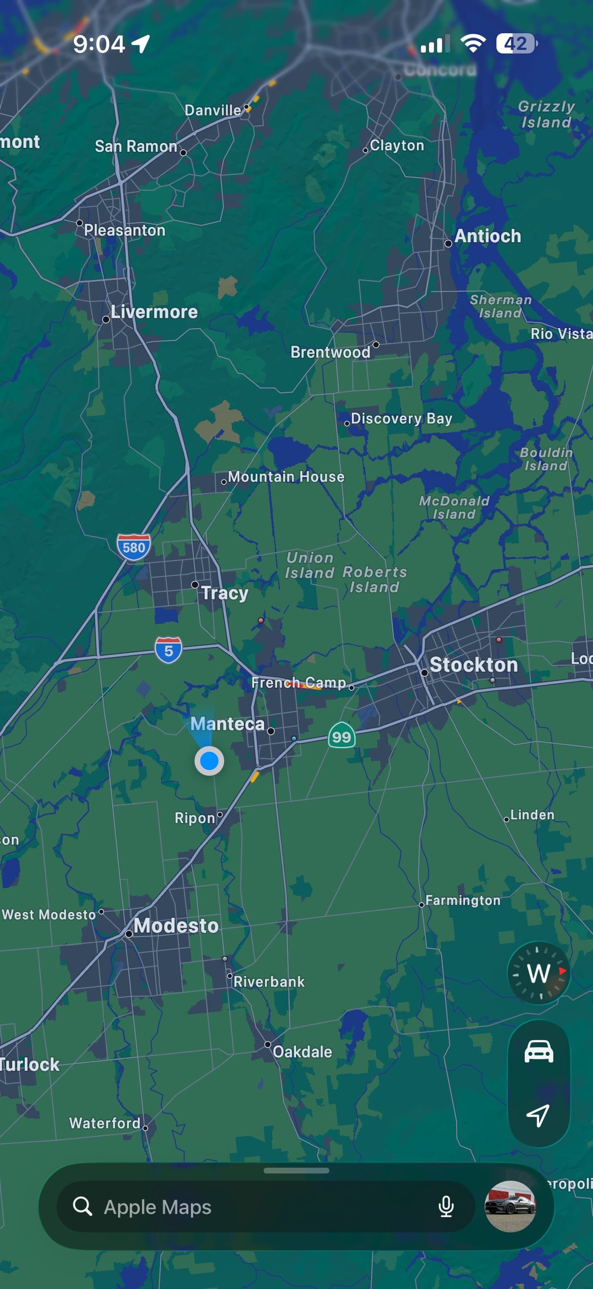 Apple Maps view of central California showing cities including Modesto, Stockton, Tracy and surrounding areas with highways